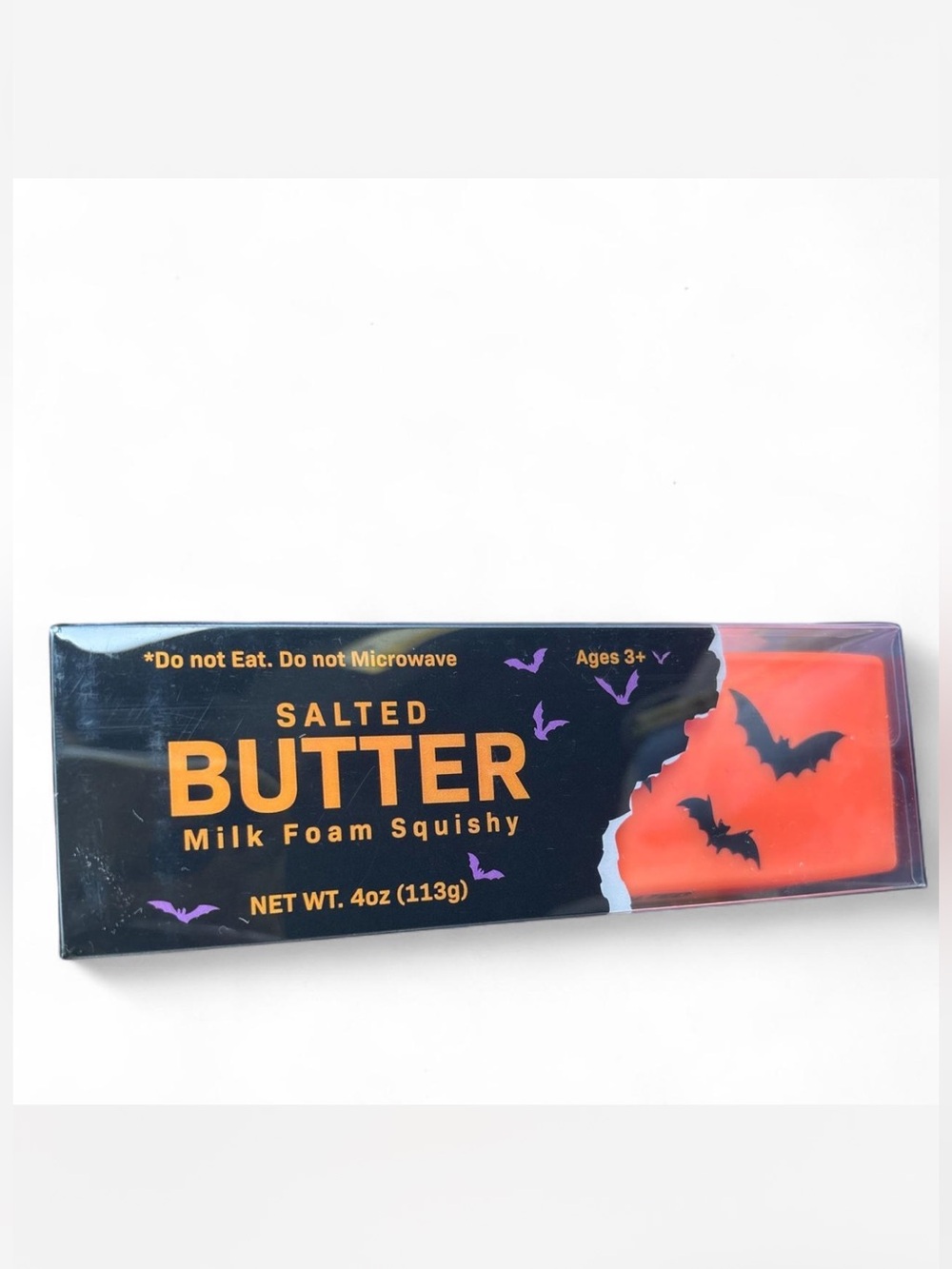 Butter Salted Butter Milk Foam Squishy Toy - Black & Orange with Purple Accents